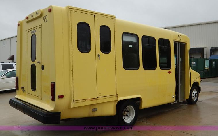 image for item J3998 2002 Ford 801 Diamond Coach transit bus