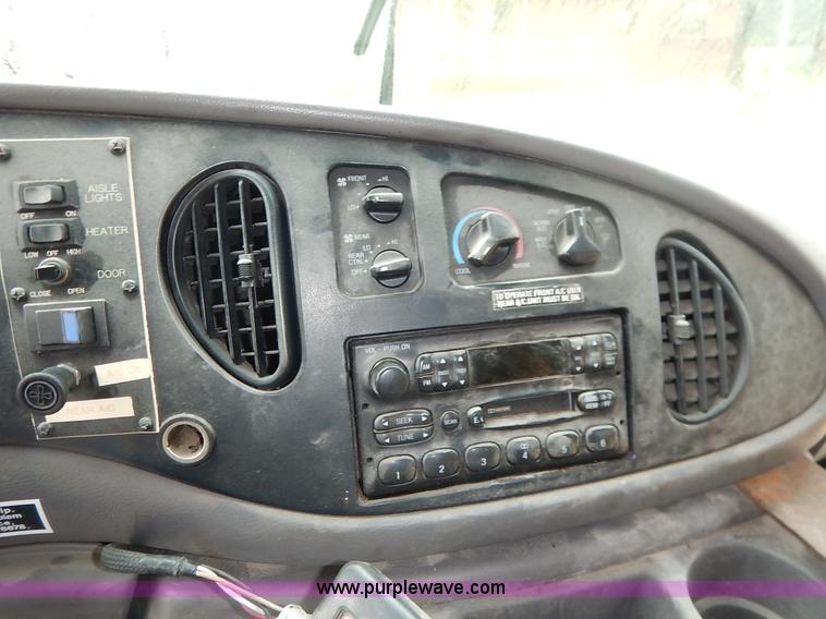 image for item J3998 2002 Ford 801 Diamond Coach transit bus