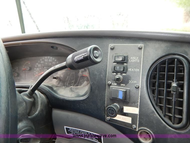 image for item J3998 2002 Ford 801 Diamond Coach transit bus