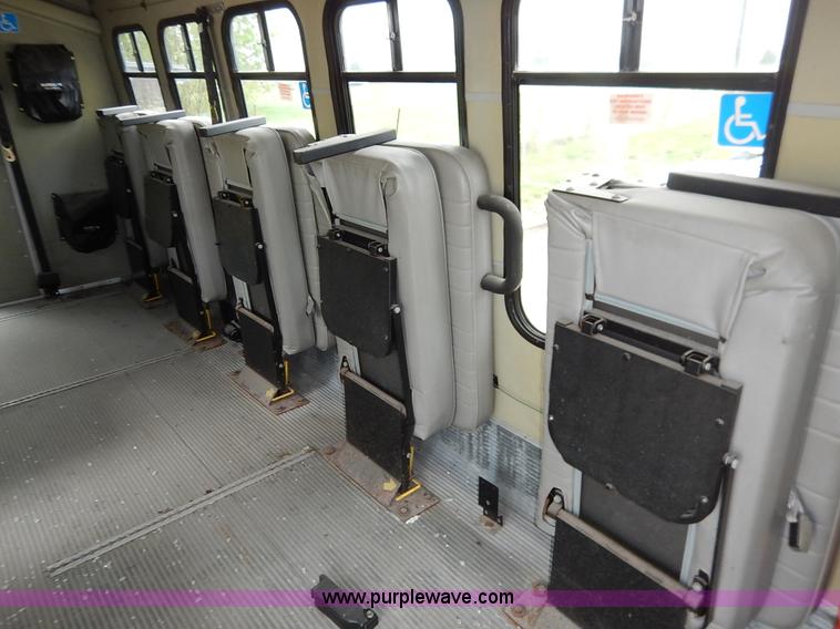 image for item J3998 2002 Ford 801 Diamond Coach transit bus