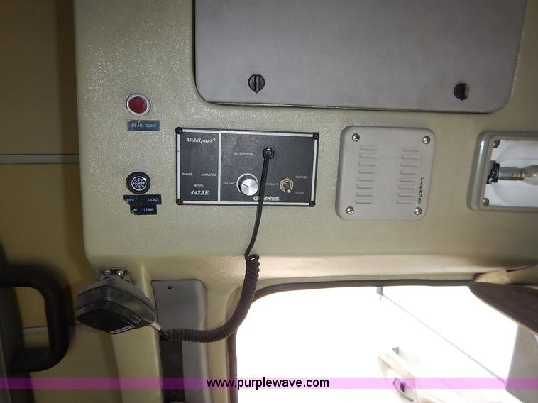 image for item J3998 2002 Ford 801 Diamond Coach transit bus