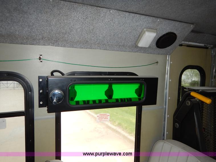 image for item J3998 2002 Ford 801 Diamond Coach transit bus