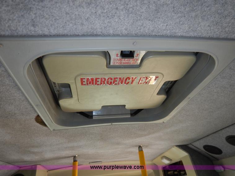 image for item J3998 2002 Ford 801 Diamond Coach transit bus