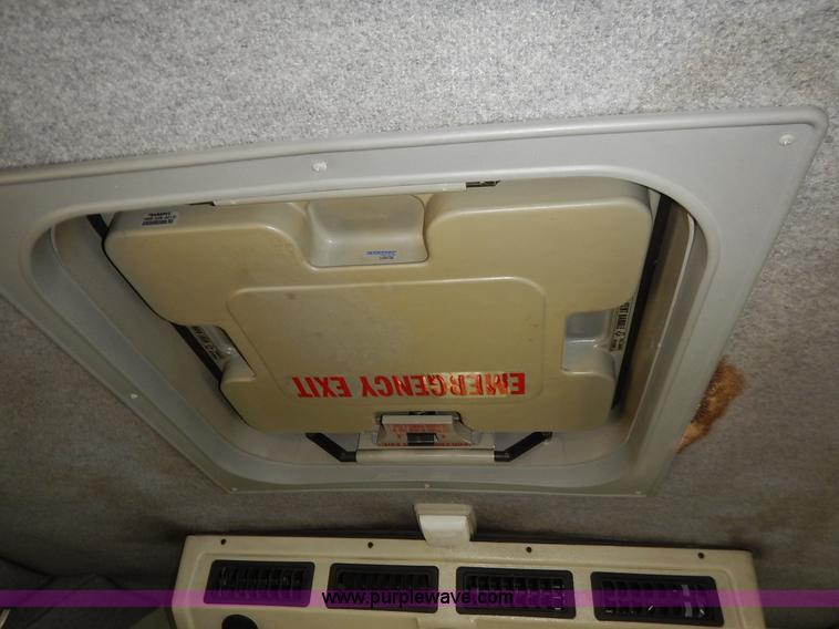 image for item J3998 2002 Ford 801 Diamond Coach transit bus