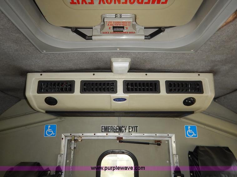 image for item J3998 2002 Ford 801 Diamond Coach transit bus