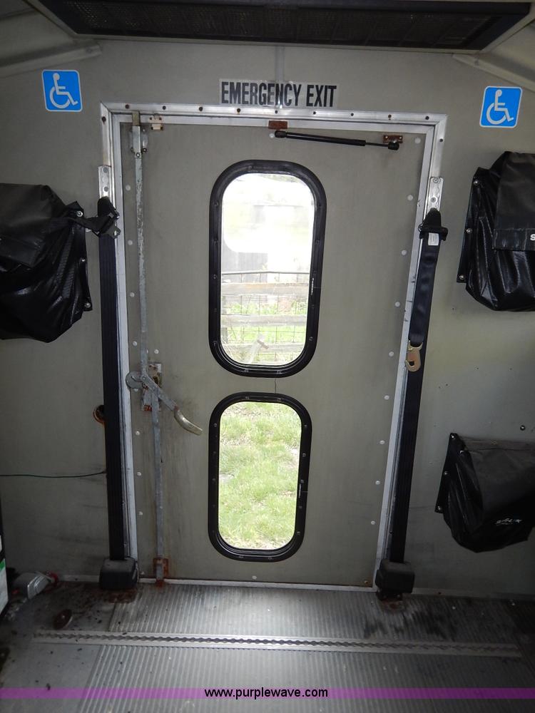 image for item J3998 2002 Ford 801 Diamond Coach transit bus