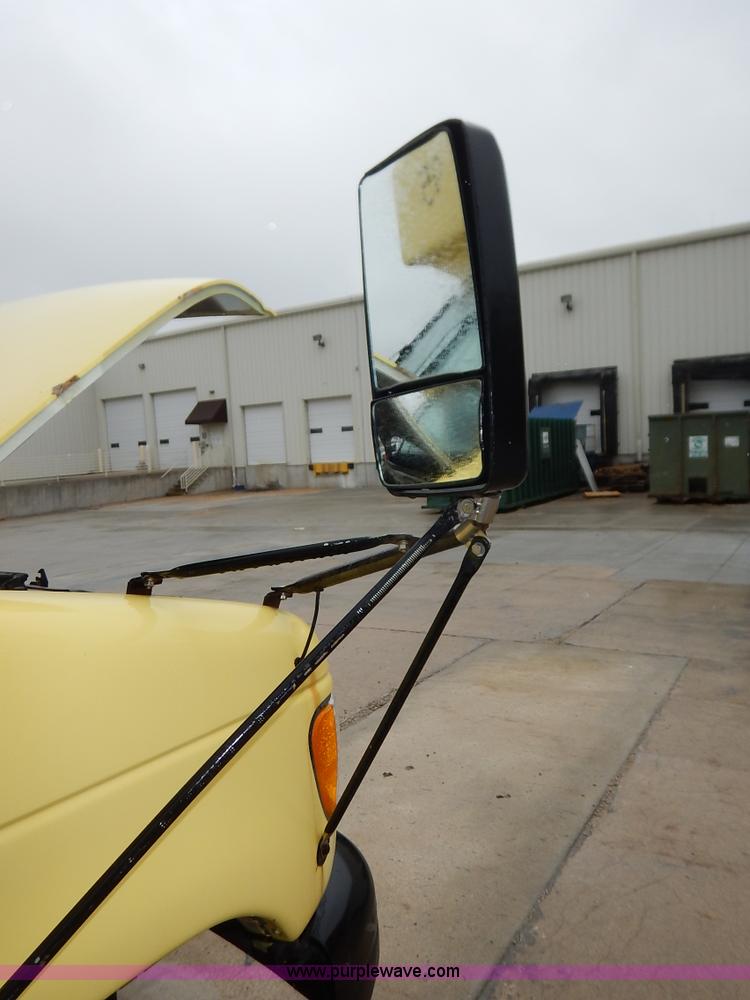 image for item J3998 2002 Ford 801 Diamond Coach transit bus