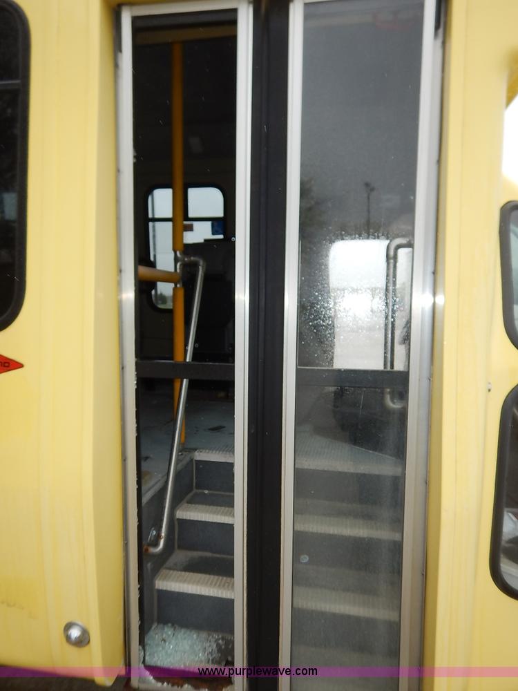 image for item J3998 2002 Ford 801 Diamond Coach transit bus