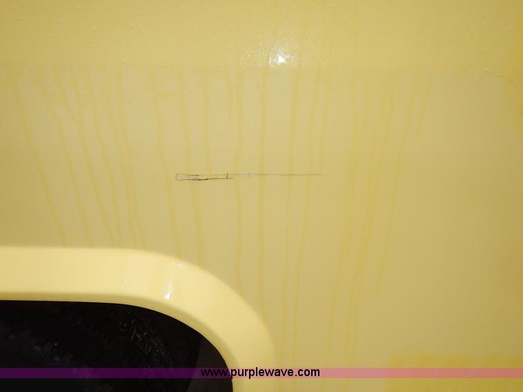 image for item J3998 2002 Ford 801 Diamond Coach transit bus