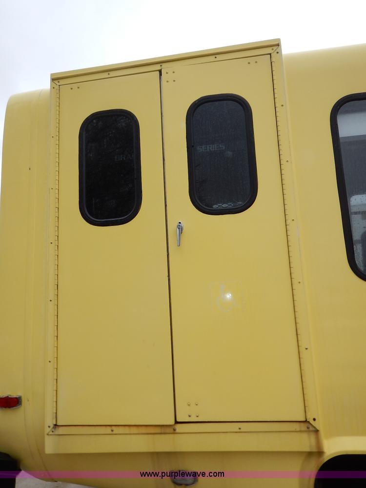 image for item J3998 2002 Ford 801 Diamond Coach transit bus