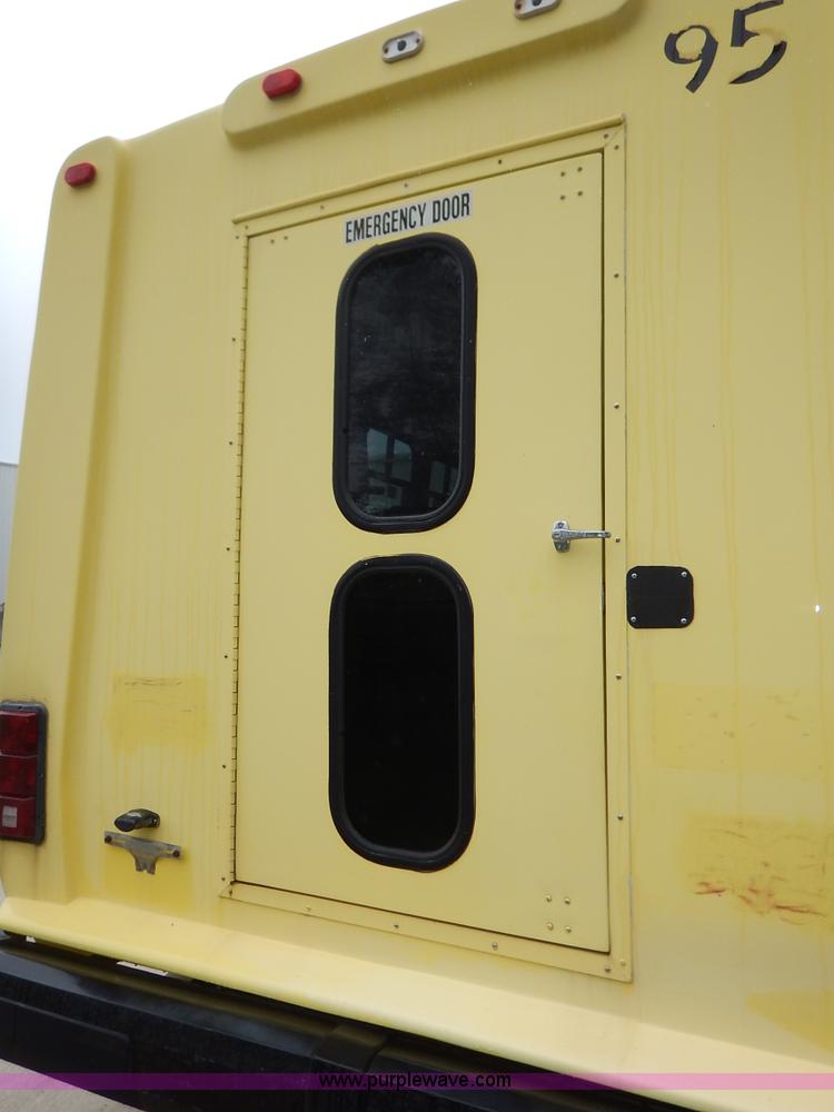 image for item J3998 2002 Ford 801 Diamond Coach transit bus