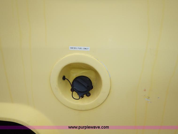 image for item J3998 2002 Ford 801 Diamond Coach transit bus