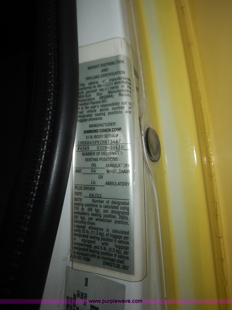 image for item J3998 2002 Ford 801 Diamond Coach transit bus