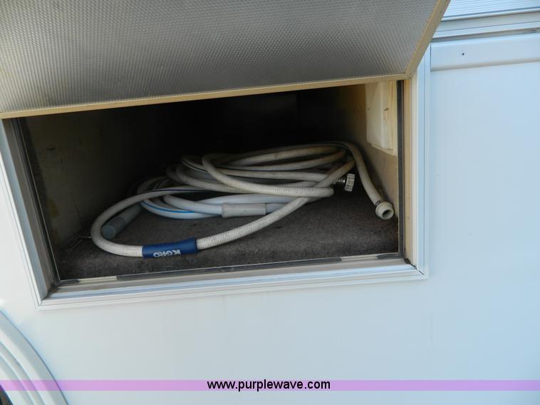 image for item K8023 1989 Chevrolet P30 Fleetwood 32' RV