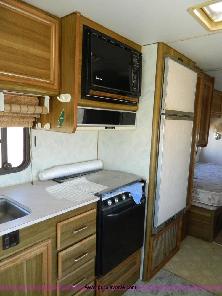 image for item K8023 1989 Chevrolet P30 Fleetwood 32' RV