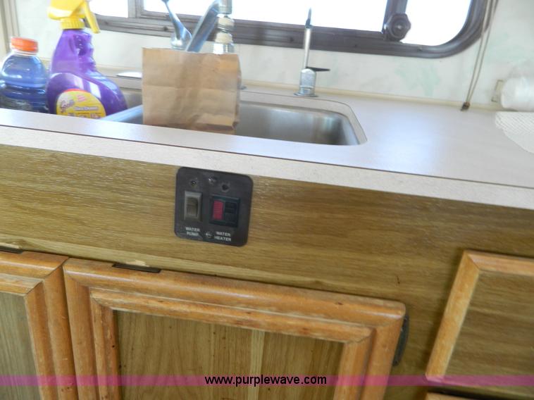 image for item K8023 1989 Chevrolet P30 Fleetwood 32' RV