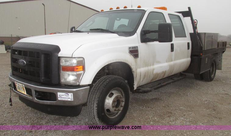 image for item H4682 2008 Ford F350 Super Duty XL Crew Cab flatbed truck