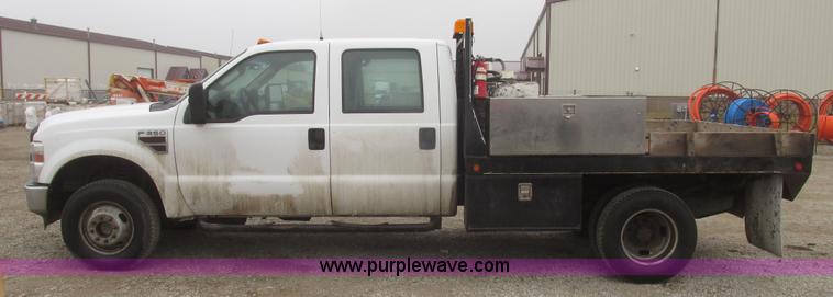 image for item H4682 2008 Ford F350 Super Duty XL Crew Cab flatbed truck