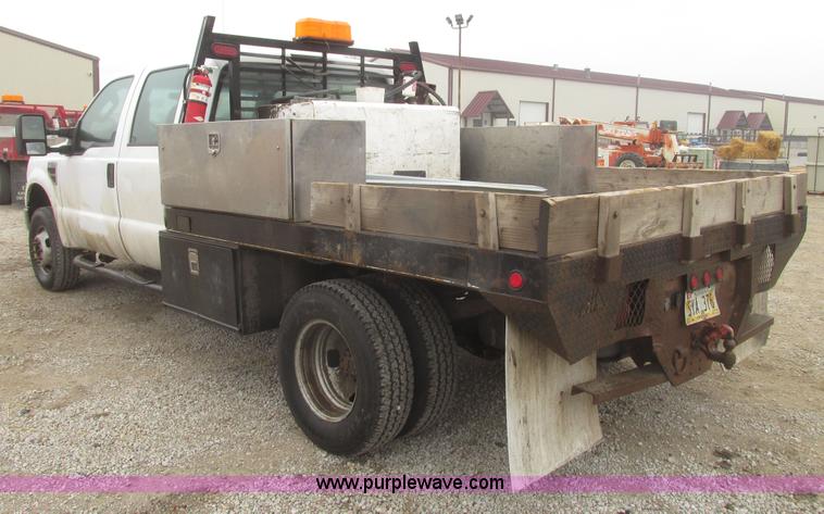 image for item H4682 2008 Ford F350 Super Duty XL Crew Cab flatbed truck