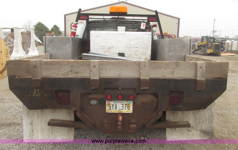 image for item H4682 2008 Ford F350 Super Duty XL Crew Cab flatbed truck