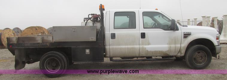 image for item H4682 2008 Ford F350 Super Duty XL Crew Cab flatbed truck