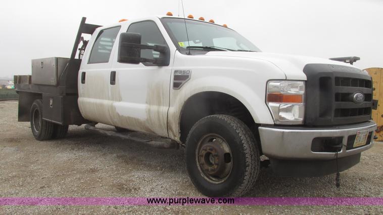 image for item H4682 2008 Ford F350 Super Duty XL Crew Cab flatbed truck