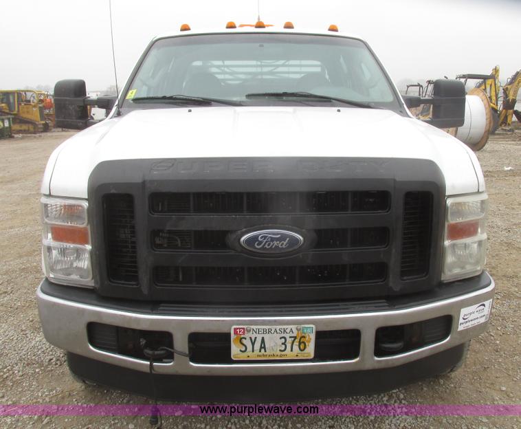 image for item H4682 2008 Ford F350 Super Duty XL Crew Cab flatbed truck