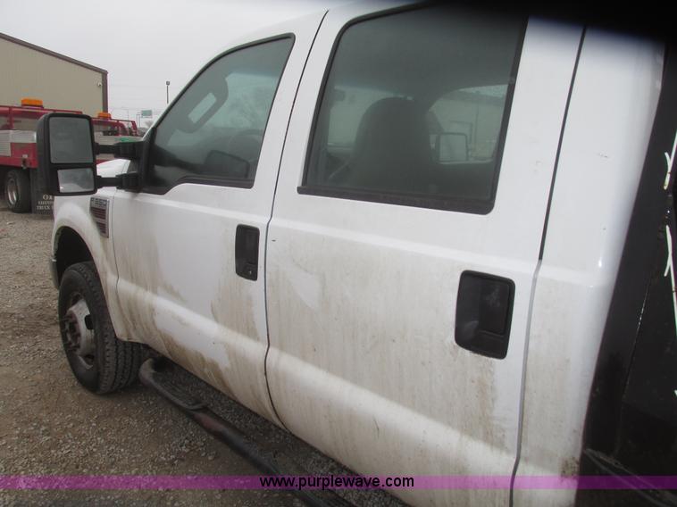 image for item H4682 2008 Ford F350 Super Duty XL Crew Cab flatbed truck