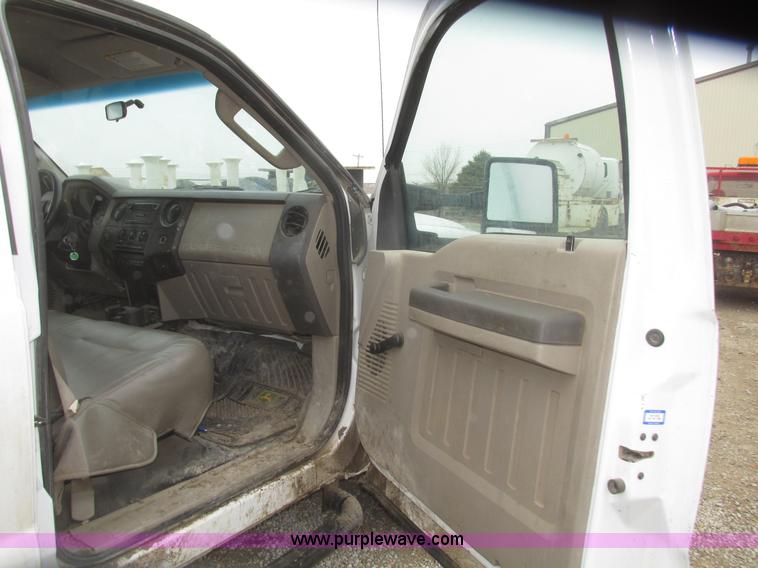 image for item H4682 2008 Ford F350 Super Duty XL Crew Cab flatbed truck