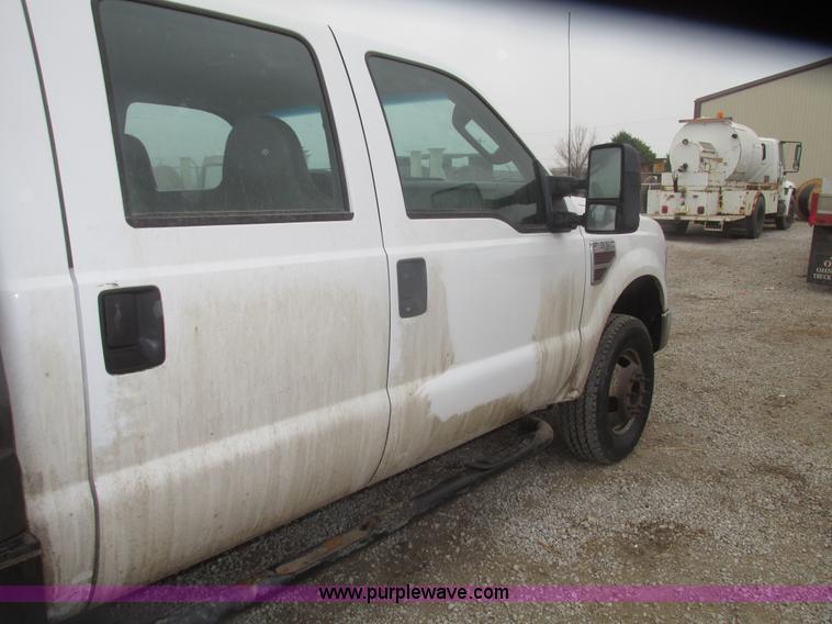 image for item H4682 2008 Ford F350 Super Duty XL Crew Cab flatbed truck