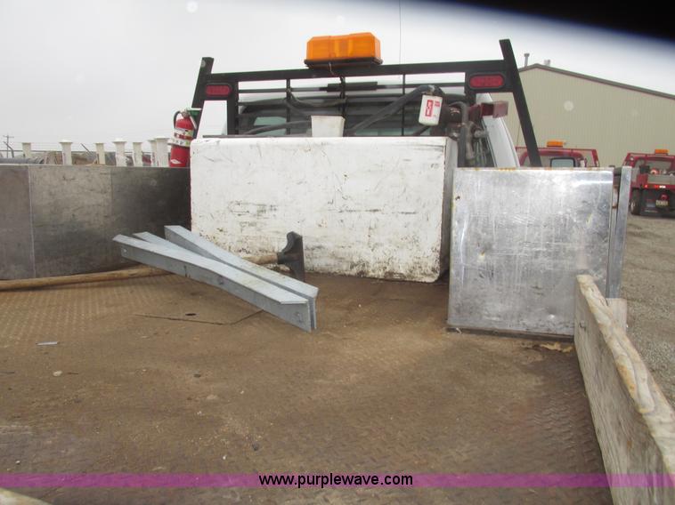 image for item H4682 2008 Ford F350 Super Duty XL Crew Cab flatbed truck