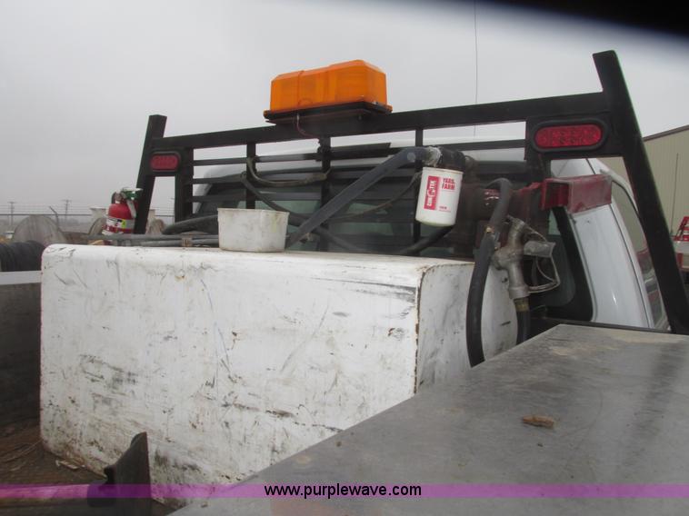 image for item H4682 2008 Ford F350 Super Duty XL Crew Cab flatbed truck