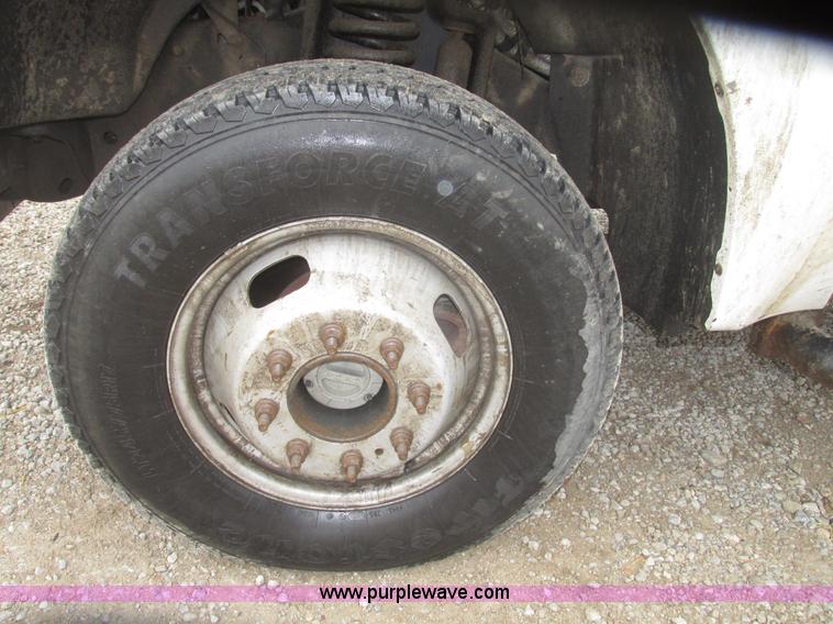 image for item H4682 2008 Ford F350 Super Duty XL Crew Cab flatbed truck