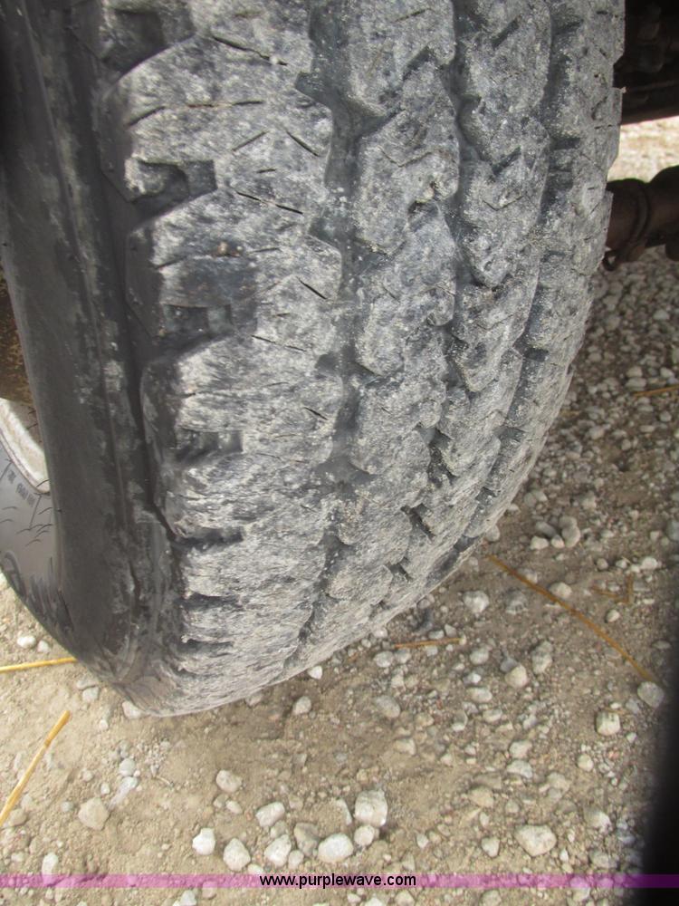 image for item H4682 2008 Ford F350 Super Duty XL Crew Cab flatbed truck