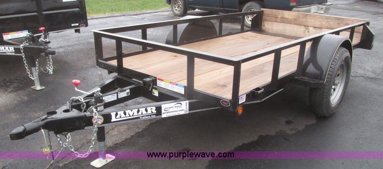 image for item H4686 2014 Lamar tilt deck trailer