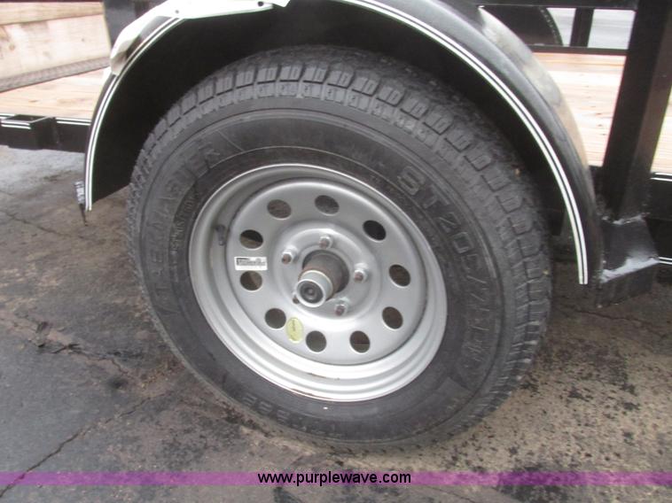 image for item H4686 2014 Lamar tilt deck trailer