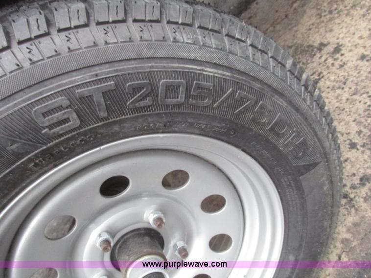 image for item H4686 2014 Lamar tilt deck trailer