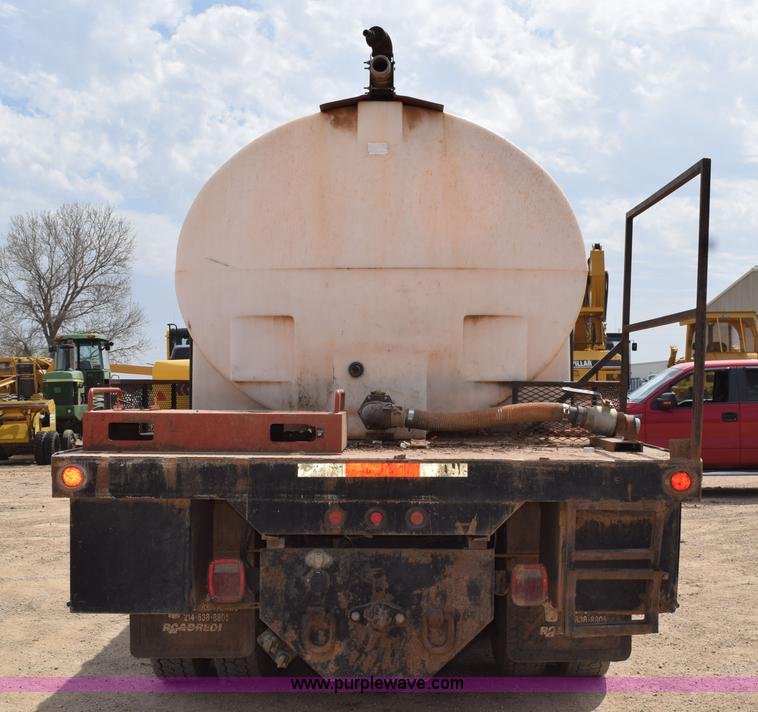 image for item H5215 1999 Freightliner FLD120 flatbed truck