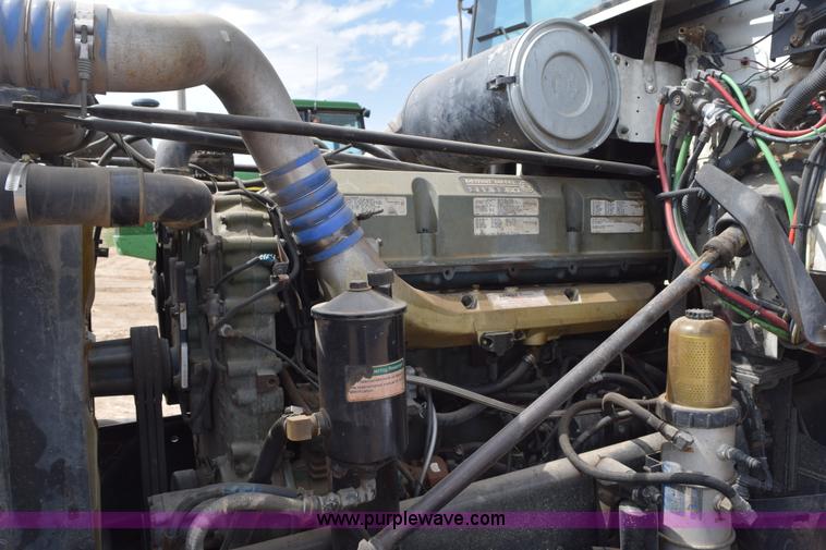 image for item H5215 1999 Freightliner FLD120 flatbed truck