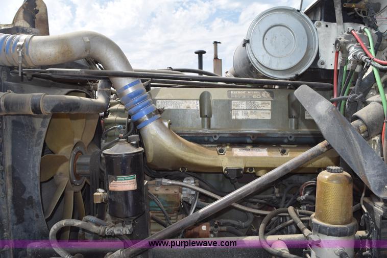 image for item H5215 1999 Freightliner FLD120 flatbed truck