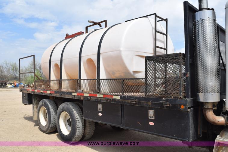 image for item H5215 1999 Freightliner FLD120 flatbed truck