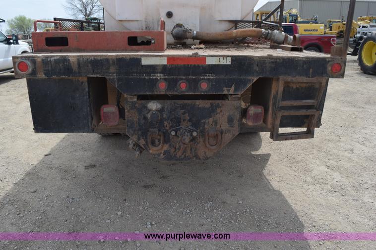 image for item H5215 1999 Freightliner FLD120 flatbed truck