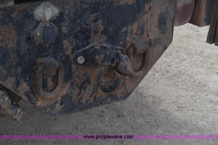 image for item H5215 1999 Freightliner FLD120 flatbed truck