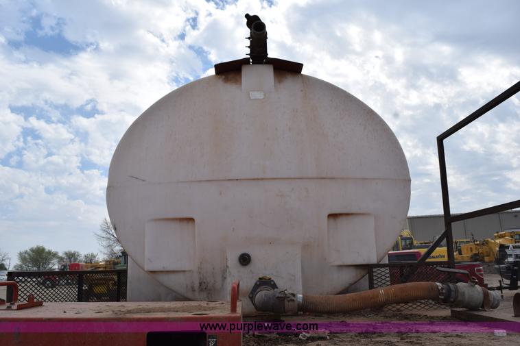 image for item H5215 1999 Freightliner FLD120 flatbed truck