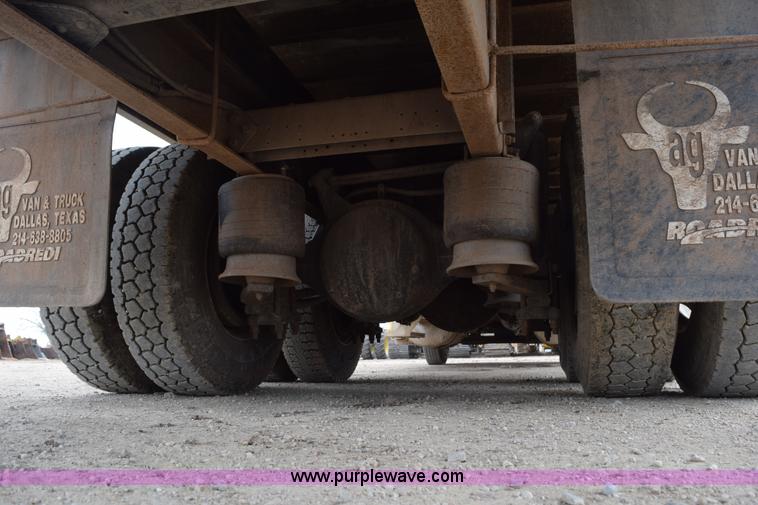 image for item H5215 1999 Freightliner FLD120 flatbed truck