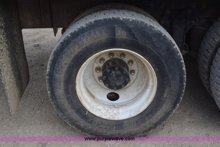 image for item H5215 1999 Freightliner FLD120 flatbed truck