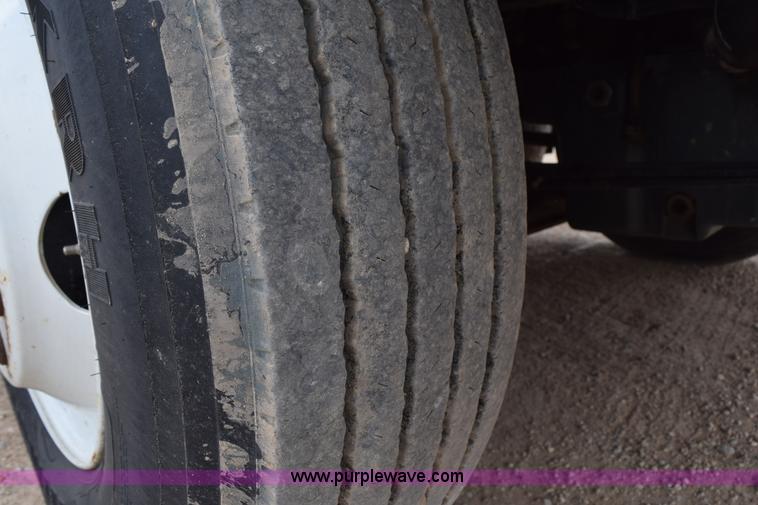 image for item H5215 1999 Freightliner FLD120 flatbed truck