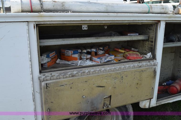 image for item H5250 2006 Ford F350 Super Duty Crew Cab utility truck