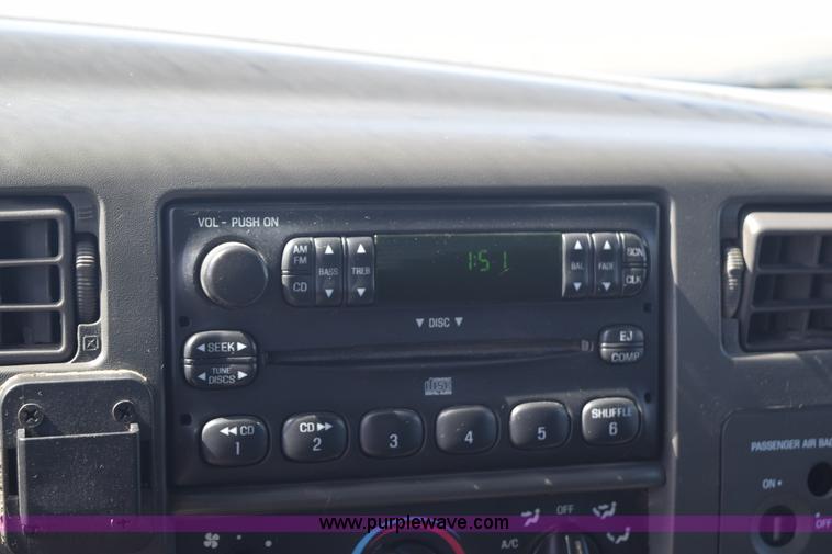 image for item K2446 2004 Ford F550 SuperCab flatbed truck