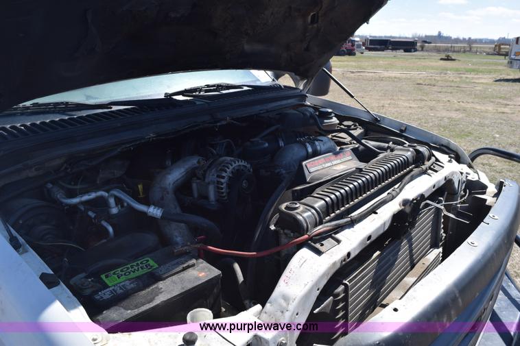 image for item K2446 2004 Ford F550 SuperCab flatbed truck